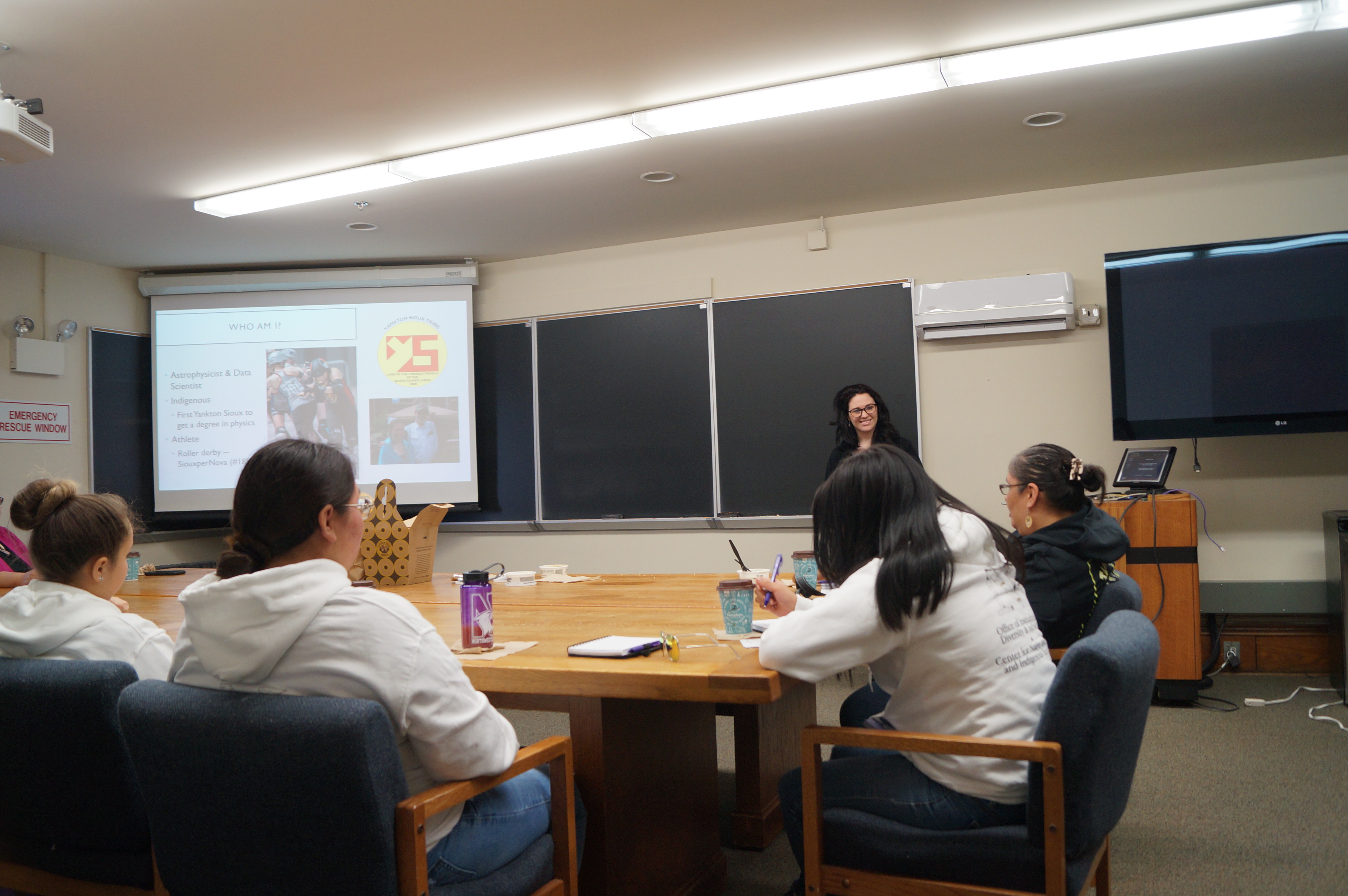 Dr. Charee Peters engages with the girls as an indigenous astrophysicist and data scientist herself, March 2019